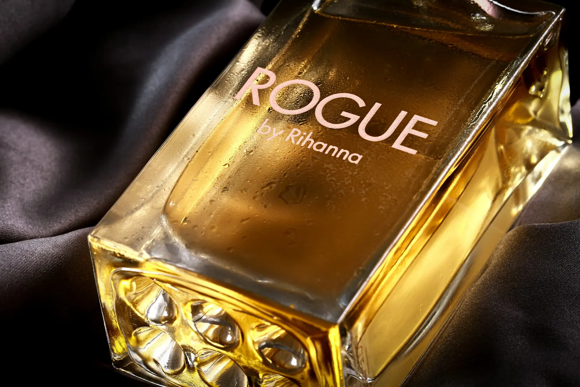 a close up of a bottle of perfume